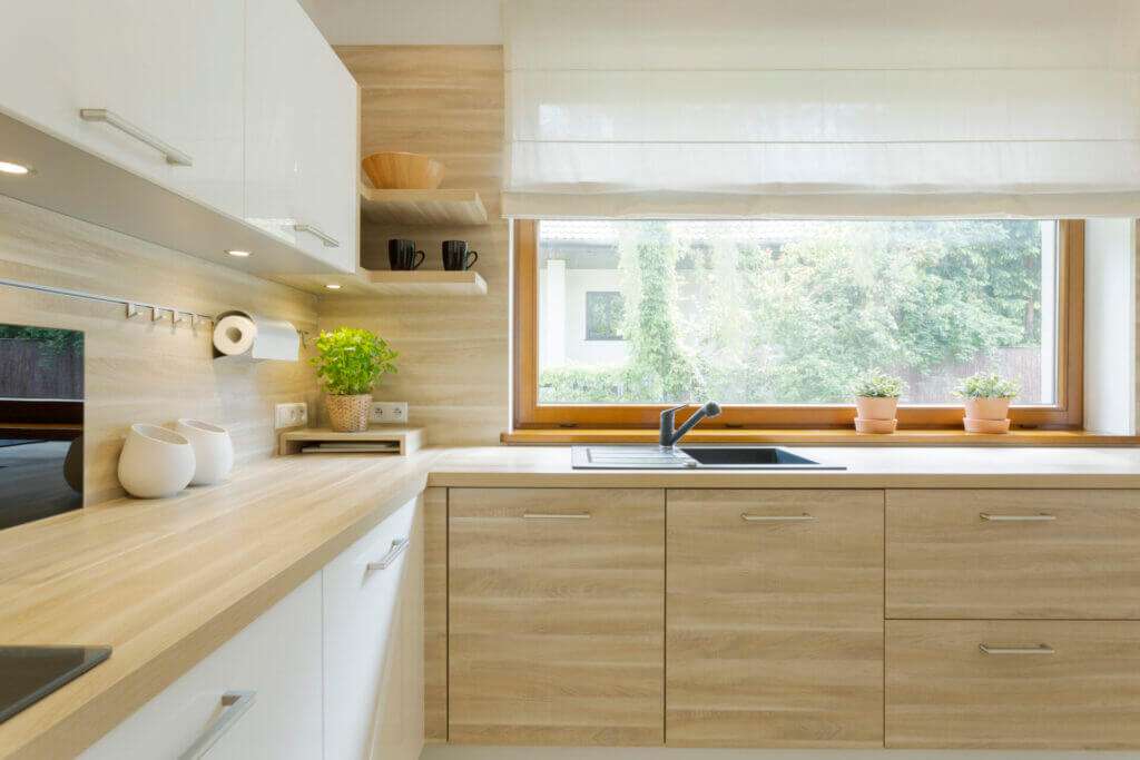 A pristine looking kitchen after learning how to clean kitchen cabinets