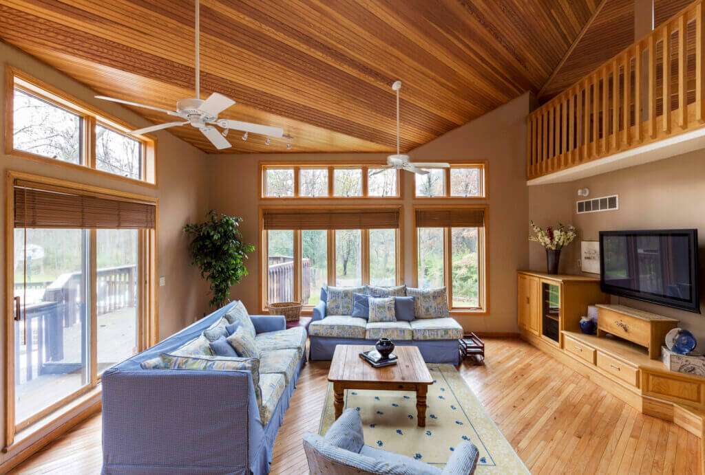 Hardwood floor an ceilings in a big living room