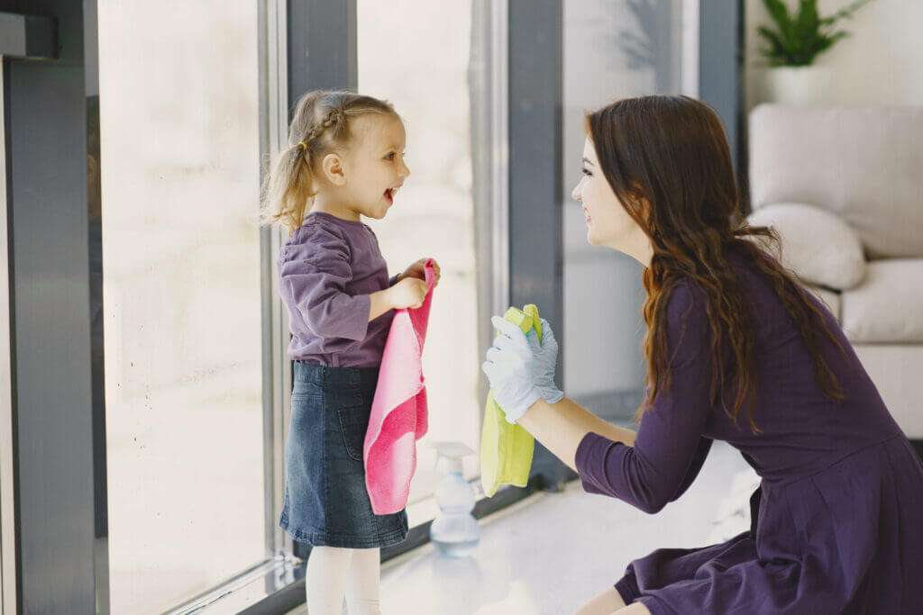 Mother and daughter doing a summer cleaning together