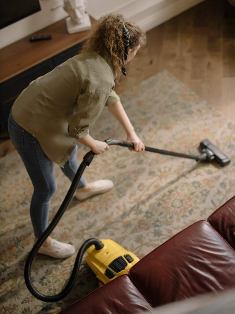 Vacuuming is one of the steps of a deep house cleaning checklist.